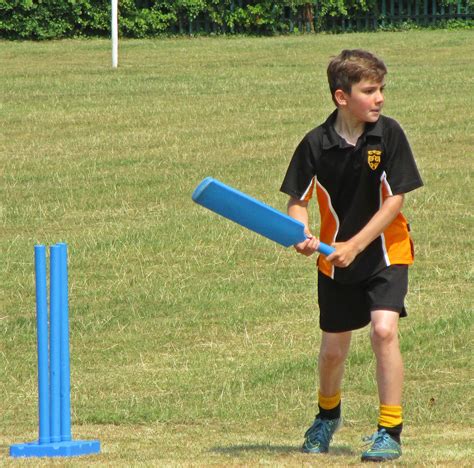 Boy playing cricket - St Winefrides