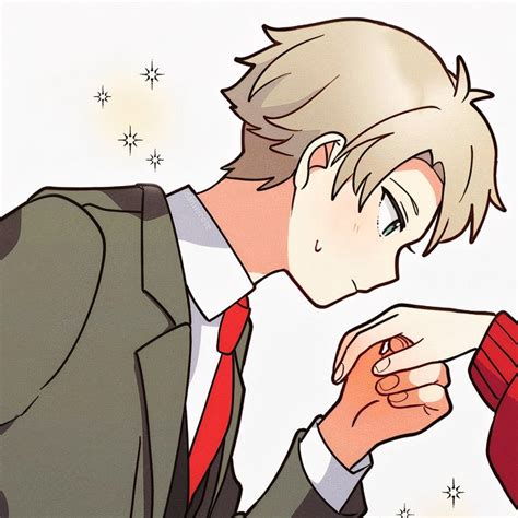 A Man In A Suit And Red Tie Kissing Another Man S Forehead With His