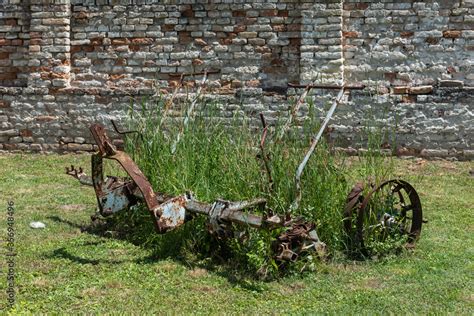 Old Forgotten Plow. An old machine used for harrowing, old and rusty Stock Photo | Adobe Stock