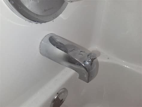 How to replace a tub faucet with no set screw? : Plumbing