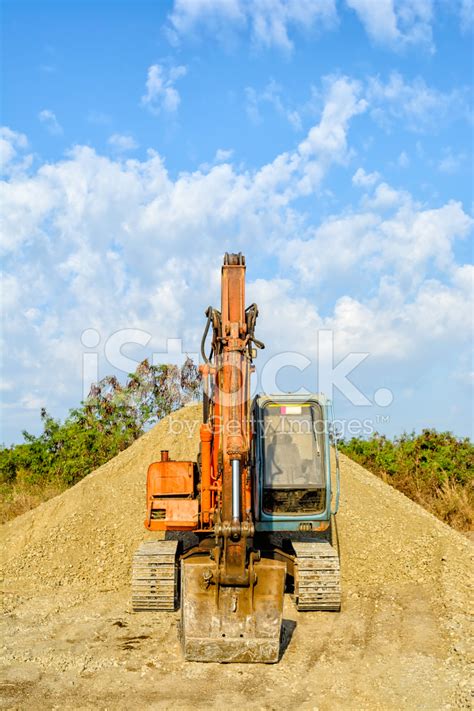 Parked Excavator Stock Photo Royalty Free Freeimages