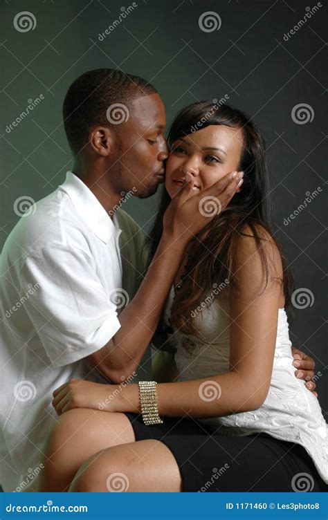 A peck on the cheek stock photo. Image of female, close - 1171460