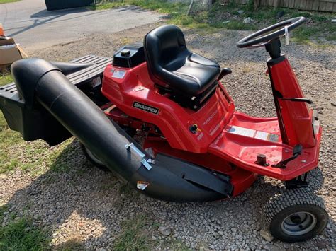 33in Snapper Rear Engine Riding Mower W155hp Has Rear Grass Bagger