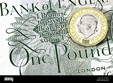 New British King Charles Iii £1 Coin On An Old £1 Note Stock Photo Alamy