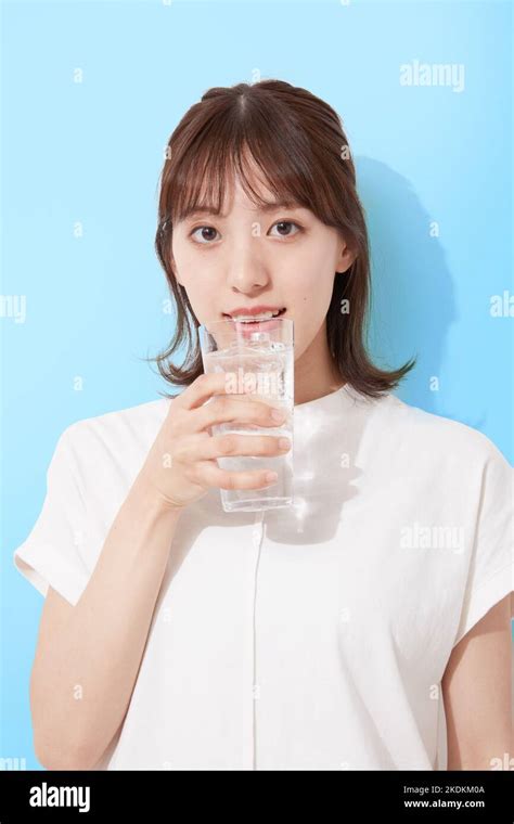 Young Japanese Woman Drinking Water Stock Photo Alamy