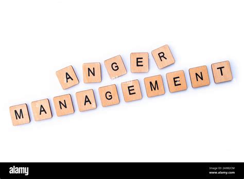 The Phrase ANGER MANAGEMENT Spelt With Wooden Letter Tiles Stock Photo