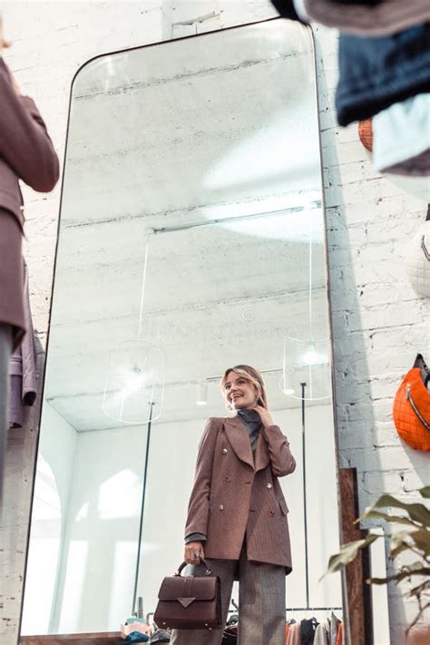 Blonde Woman Wearing Stylish Jacket Standing In Clothing Boutique Stock Photo Image Of Female