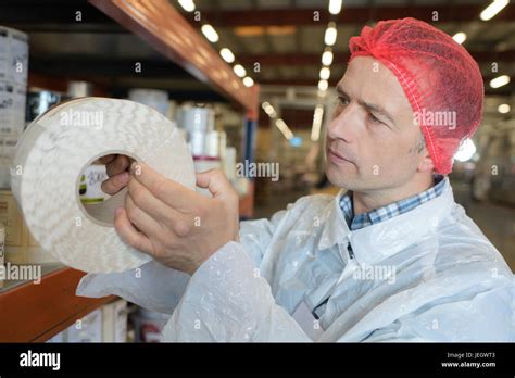 Inspecting The Product Stock Photo Alamy