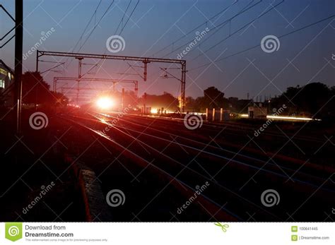 Railroad station at night stock image. Image of life - 100641445