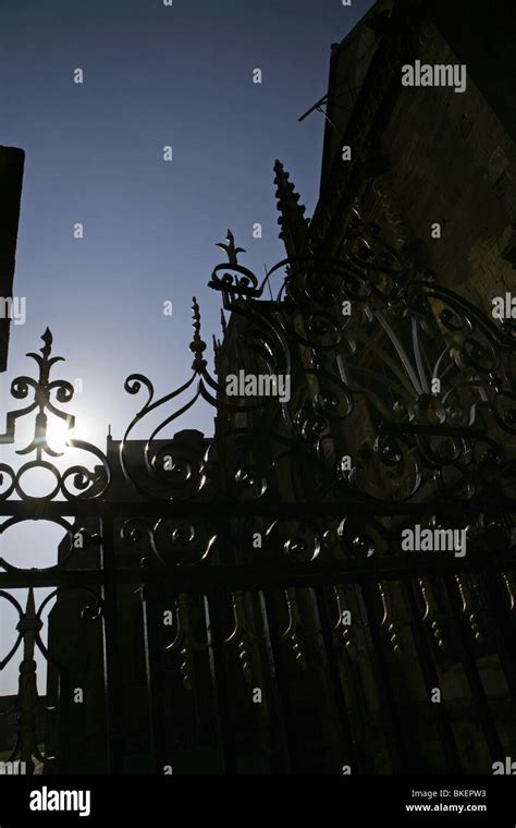 Ornate Wrought Iron Gates At Sherborne Abbey Dorset England Stock