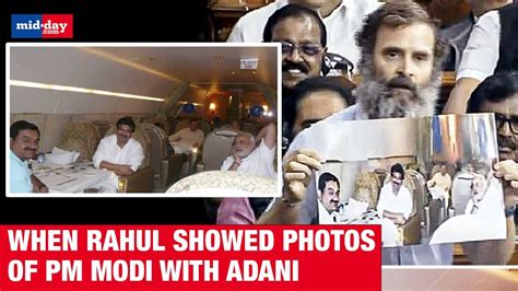 Rahul Gandhi Shows Old Photograph Of Pm Modi With Adani Questions Pms