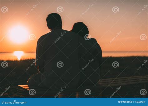 Adult Couple Embracing At Sunset And Sea Stock Image Image Of