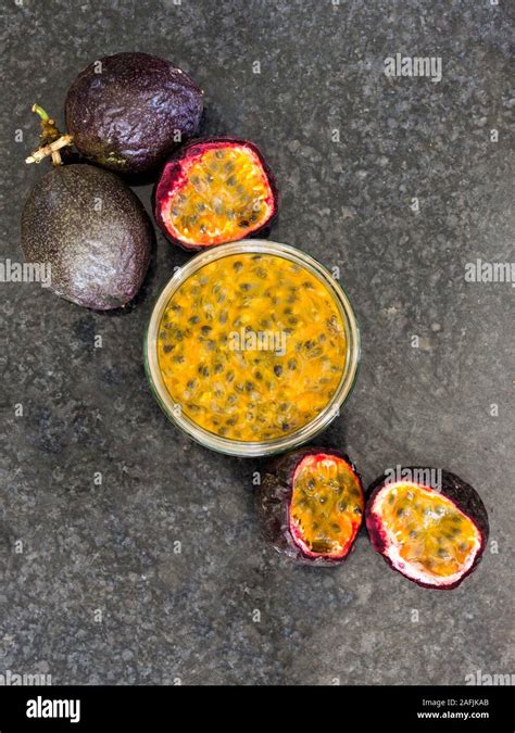 Lay Flat Composition Showing Passion Fruit Whole And Sliced And