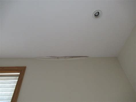 Inspection of ceiling with water leak entering the home. | US-BES