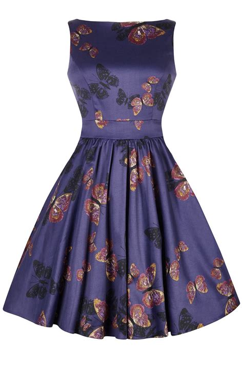 This Classic Lady Vintage 50s Tea Dress Features A 50s Style Flared