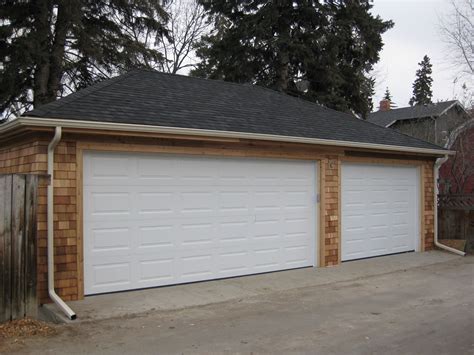 Triple Car Garage With Cedar Shingle Exterior Shaw Renovation