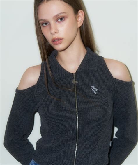 A Gem Komnasty Fancy Club Shoulder Cut Out Zip Up