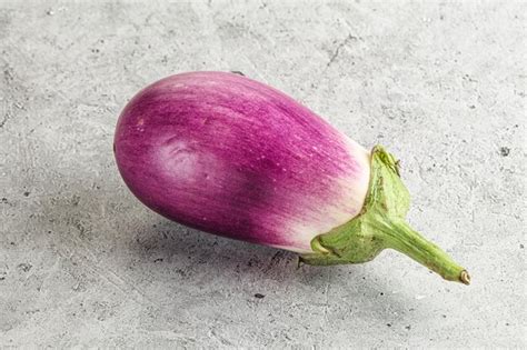 Premium Photo Raw Purple Ripe Eggplant For Cooking Over Background