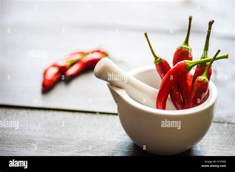 Red Hot Chilli Peppers On Dark Background With Copyspace Stock Photo Alamy