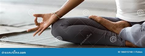 African Woman Sitting In Lotus Position Do Meditation Practice Closeup