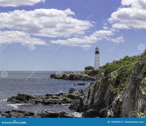 Lighthouse on a Rocky Shore Stock Photo - Image of cape, clear: 132590912