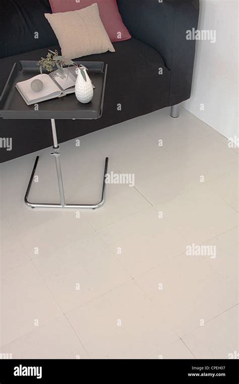 Modern Sofa And Side Table Stock Photo - Alamy