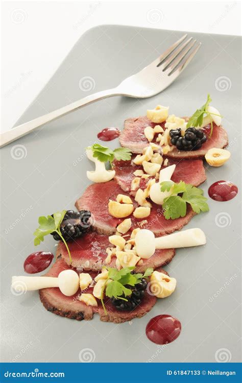 Beef carpaccio appetizer stock image. Image of pickle - 61847133