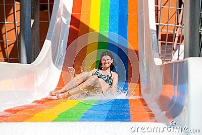 Woman In Bikini Sliding Water Park Stock Photography CartoonDealer