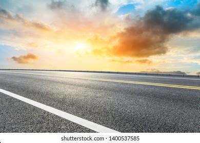 Asphalt Road Sky Clouds Sunsetroad Background Stock Photo