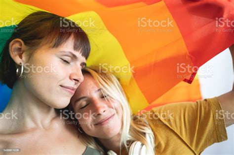 Portrait Of Young Lesbian Couple Hugging Each Other While Standing