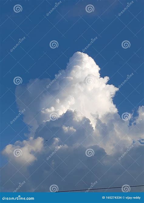 A Massive Cloud Beautifully Lit By The Setting Sun - Cumulus Congestus ...