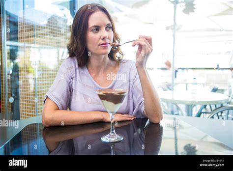 Pretty Brunette Enjoying Chocolate Dessert Stock Photo Alamy