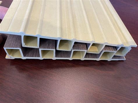 China Wholesale Hotel Panel Heat Insulation Wood Grain Interior WPC PVC