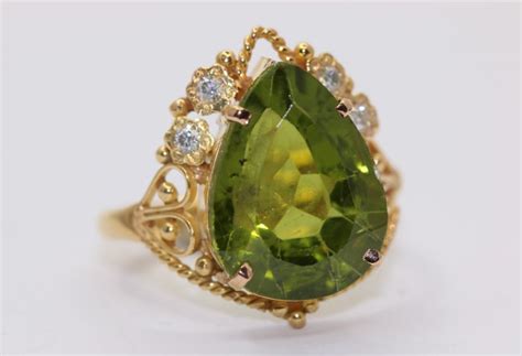 18 carats Or jaune Bague 8 00 ct Péridots Diamants Catawiki