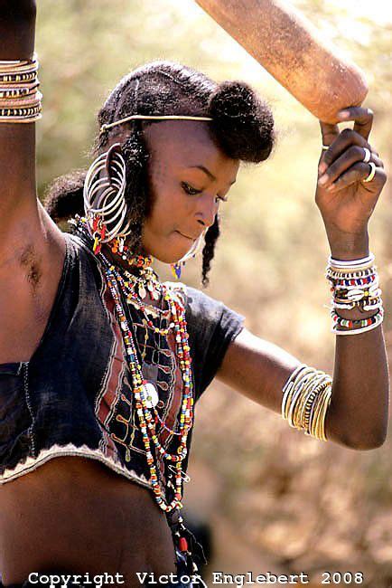 Africa Wodaabe Bororo Fulani Nomad Woman Pounding Millet Niger