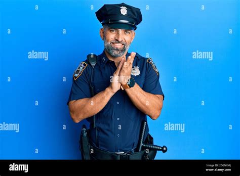 Middle Age Handsome Man Wearing Police Uniform Clapping And Applauding