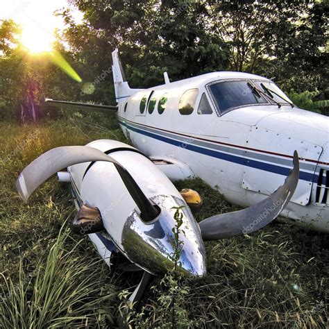 Airplane wreck in the jungle ⬇ Stock Photo, Image by © Stockdonkey #30048847