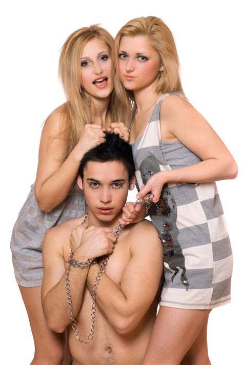Two Blonde And A Guy In Chains Stock Image Image Of Attractive Girls