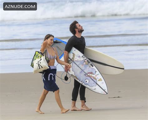 Hemsworth Brothers Reunite In Byron Bay With Liam S Bikini Clad Girlfriend Model Gabriella