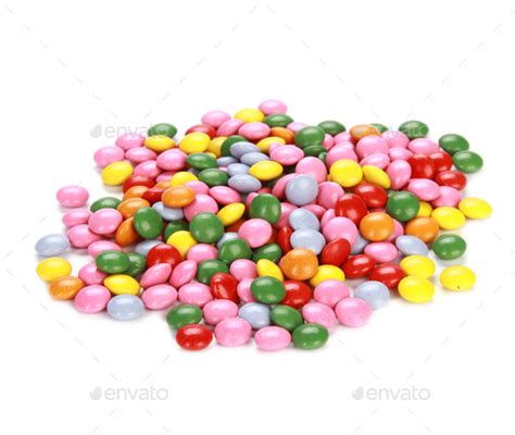 Pile Of Small Colorful Coated Chocolate Candies Isolated On A White