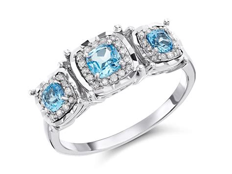 9ct White Gold Blue Topaz And Diamond Trilogy Cluster Ring 15pts