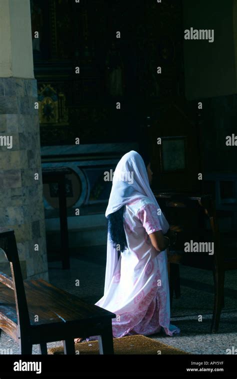 Christian Girl Praying In Church