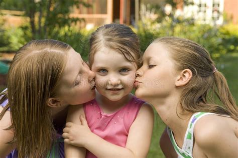 Three Girls Kissing Stock Image Image Of Garden Girls 15324225