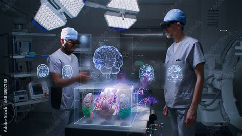 Multiethnic Surgeons Work In Operating Room Wearing Ar Headsets Using