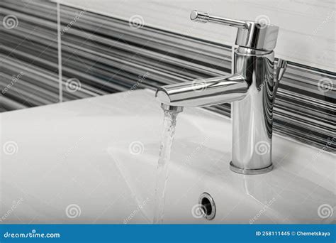 Stream Of Water Flowing From Tap In Bathroom Stock Image Image Of