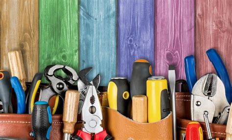 Premium Photo Tool Belt With Tools On Wooden Background