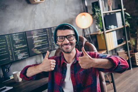 Photo Of Happy Positive Freelancer Wear Hat Glasses Showing Two Thumbs