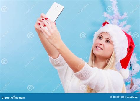 Woman In Santa Hat Taking Selfie Stock Image Image Of Phone