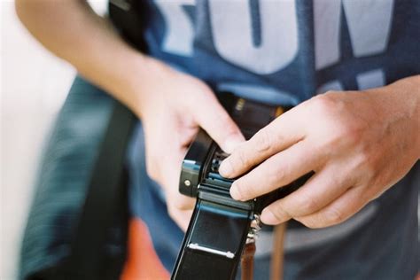 Premium Photo Midsection Of Man Holding Camera