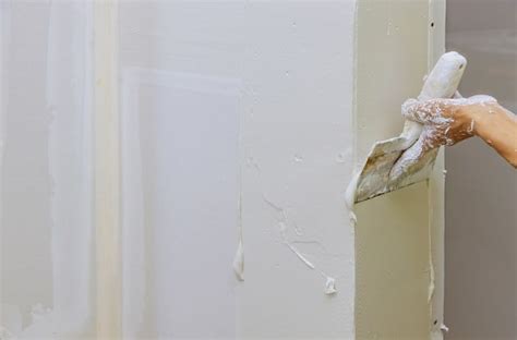 Guide To Repairing Holes In Drywall - Home Guide Guru